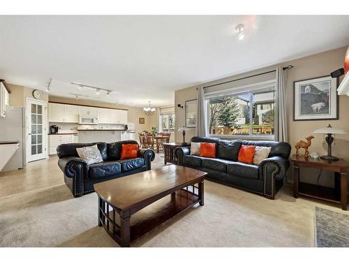 396 Rocky Ridge Drive Nw, Calgary, AB - Indoor Photo Showing Living Room