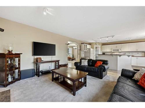 396 Rocky Ridge Drive Nw, Calgary, AB - Indoor Photo Showing Living Room