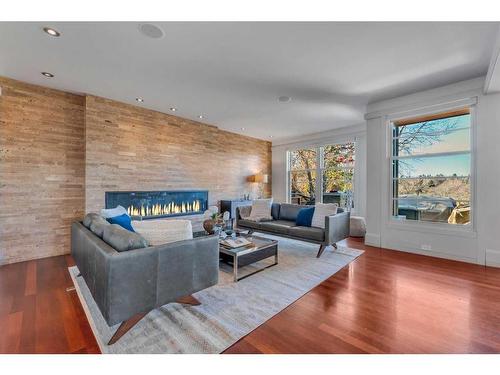 3209 5 Street Nw, Calgary, AB - Indoor Photo Showing Living Room With Fireplace