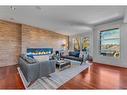 3209 5 Street Nw, Calgary, AB  - Indoor Photo Showing Living Room With Fireplace 