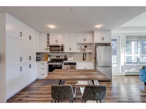 1201-350 Livingston Common Ne, Calgary, AB - Indoor Photo Showing Kitchen With Stainless Steel Kitchen