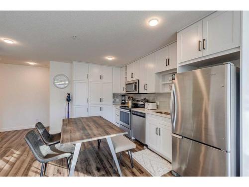 1201-350 Livingston Common Ne, Calgary, AB - Indoor Photo Showing Kitchen With Stainless Steel Kitchen