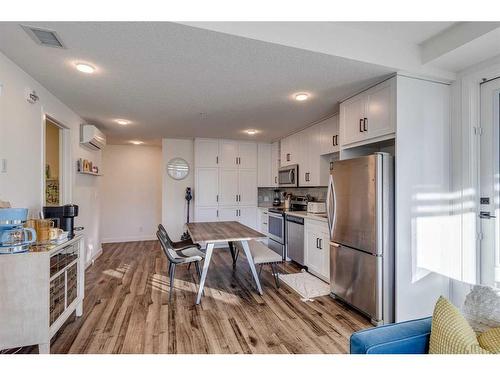 1201-350 Livingston Common Ne, Calgary, AB - Indoor Photo Showing Kitchen With Stainless Steel Kitchen