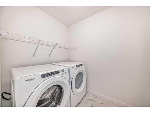 341 Baneberry Way Sw, Airdrie, AB - Indoor Photo Showing Laundry Room