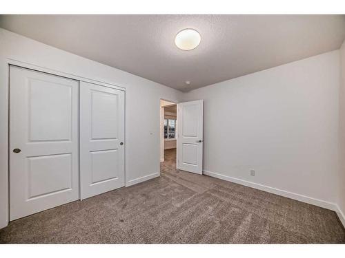 341 Baneberry Way Sw, Airdrie, AB - Indoor Photo Showing Other Room