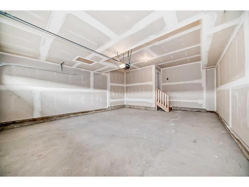 341 Baneberry Way Sw, Airdrie, AB - Indoor Photo Showing Garage