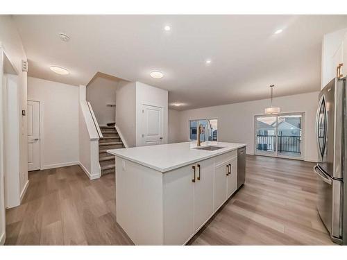 341 Baneberry Way Sw, Airdrie, AB - Indoor Photo Showing Kitchen