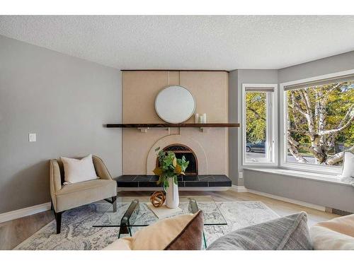 544 Brookpark Drive Sw, Calgary, AB - Indoor Photo Showing Living Room With Fireplace