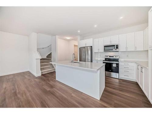 1046 Thimbleberry Hill Sw, Airdrie, AB - Indoor Photo Showing Kitchen