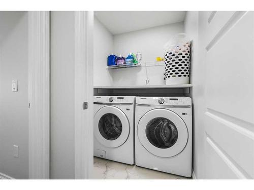 289 Corner Meadows Way Ne, Calgary, AB - Indoor Photo Showing Laundry Room