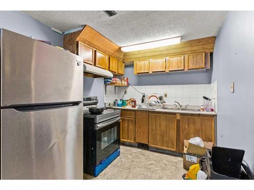 288 Whitworth Way Ne, Calgary, AB - Indoor Photo Showing Kitchen With Double Sink