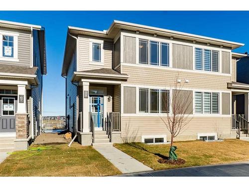 71 Carringford Road Nw, Calgary, AB - Outdoor With Facade