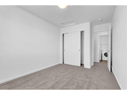 71 Carringford Road Nw, Calgary, AB - Indoor Photo Showing Other Room