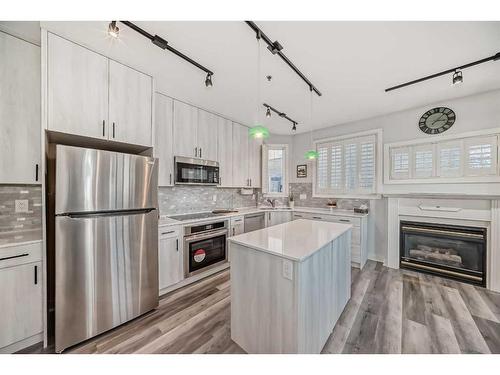 201-3412 Parkdale Boulevard Nw, Calgary, AB - Indoor Photo Showing Kitchen With Upgraded Kitchen