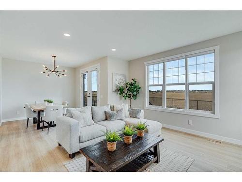 459 Kinniburgh Loop, Chestermere, AB - Indoor Photo Showing Living Room