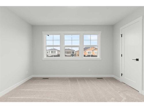 459 Kinniburgh Loop, Chestermere, AB - Indoor Photo Showing Other Room