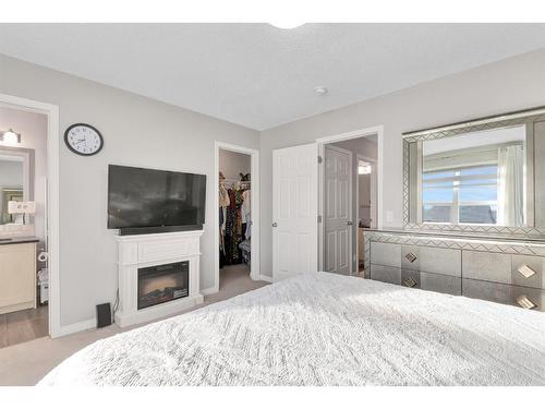 851 Carrington Boulevard Nw, Calgary, AB - Indoor With Fireplace