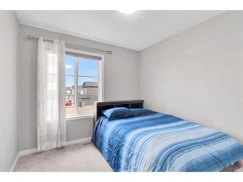 851 Carrington Boulevard Nw, Calgary, AB - Indoor Photo Showing Bedroom