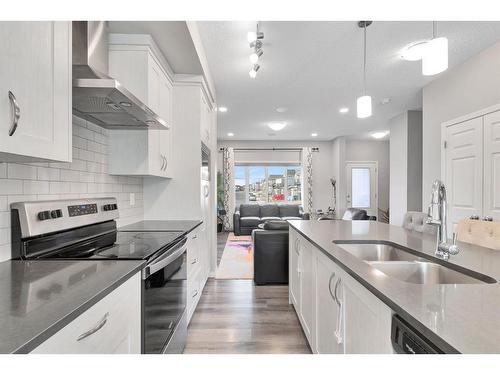 851 Carrington Boulevard Nw, Calgary, AB - Indoor Photo Showing Kitchen With Stainless Steel Kitchen With Double Sink With Upgraded Kitchen