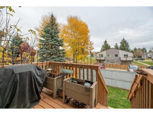 4-101 Elm Place, Okotoks, AB - Outdoor With Deck Patio Veranda