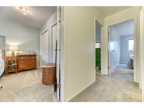 4-101 Elm Place, Okotoks, AB - Indoor Photo Showing Bedroom