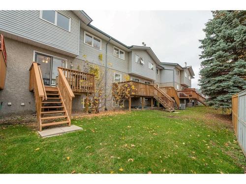 4-101 Elm Place, Okotoks, AB - Outdoor With Deck Patio Veranda With Exterior