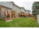 4-101 Elm Place, Okotoks, AB  - Outdoor With Deck Patio Veranda With Exterior 