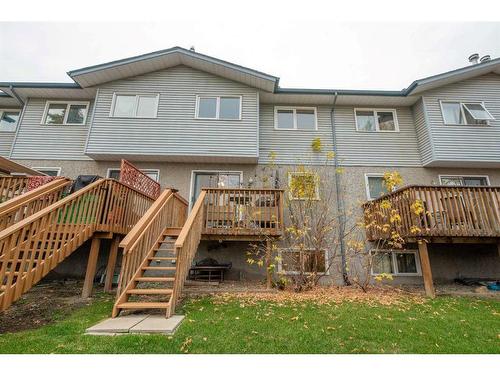 4-101 Elm Place, Okotoks, AB - Outdoor With Deck Patio Veranda With Exterior