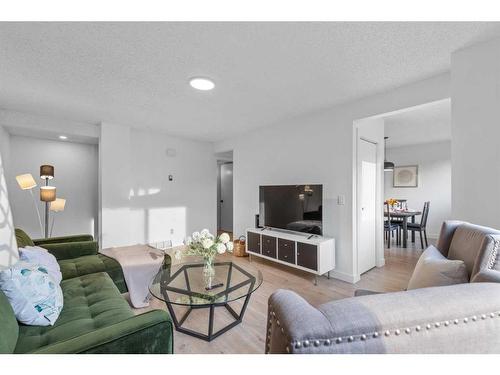 85S-203 Lynnview Road Se, Calgary, AB - Indoor Photo Showing Living Room