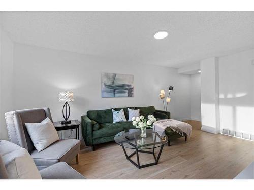 85S-203 Lynnview Road Se, Calgary, AB - Indoor Photo Showing Living Room