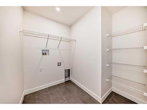 88 Sugarsnap Way Se, Calgary, AB - Indoor With Storage