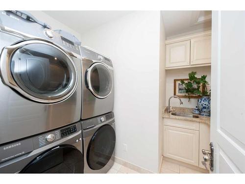 814 Radford Road Ne, Calgary, AB - Indoor Photo Showing Laundry Room