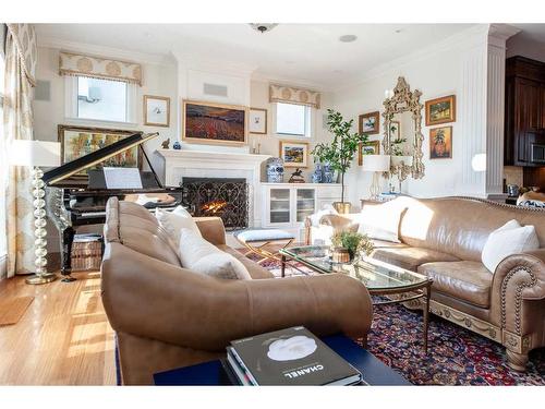 814 Radford Road Ne, Calgary, AB - Indoor Photo Showing Living Room With Fireplace