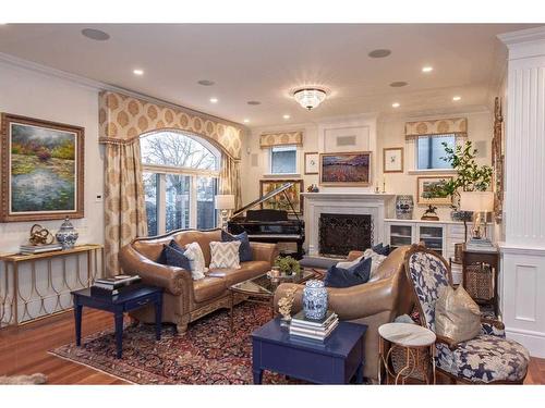 814 Radford Road Ne, Calgary, AB - Indoor Photo Showing Living Room With Fireplace