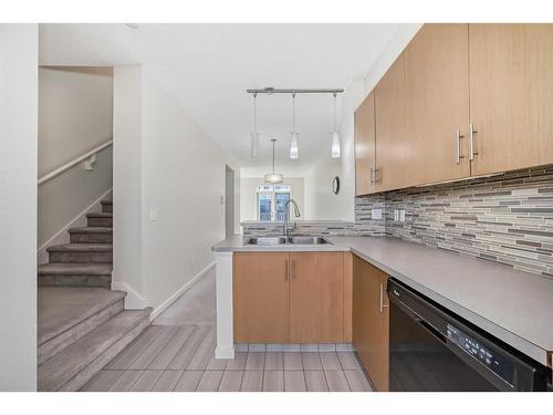 363 Walden Drive Se, Calgary, AB - Indoor Photo Showing Kitchen With Double Sink