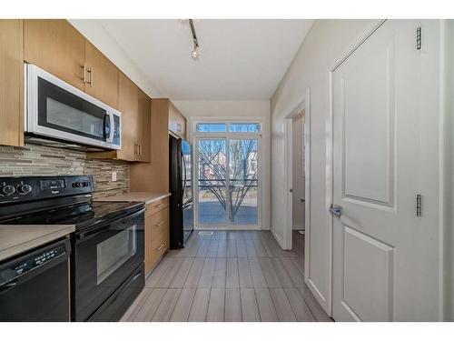 363 Walden Drive Se, Calgary, AB - Indoor Photo Showing Kitchen