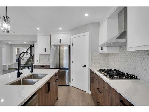 163 Springmere Way, Chestermere, AB - Indoor Photo Showing Kitchen With Stainless Steel Kitchen With Double Sink With Upgraded Kitchen