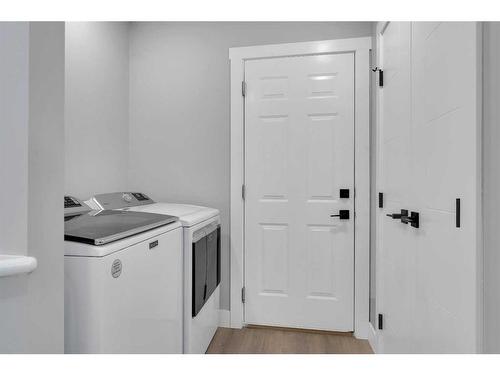 163 Springmere Way, Chestermere, AB - Indoor Photo Showing Laundry Room