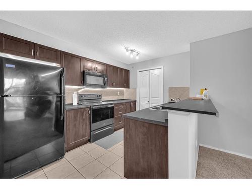 5307-16969 24 Street Sw, Calgary, AB - Indoor Photo Showing Kitchen