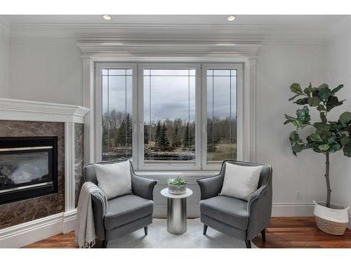 32138 Township Road 260, Rural Rocky View County, AB - Indoor Photo Showing Living Room With Fireplace