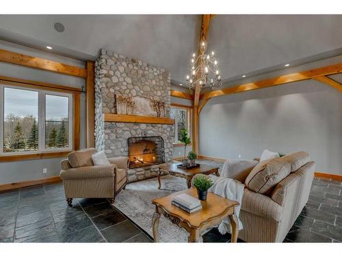 32138 Township Road 260, Rural Rocky View County, AB - Indoor Photo Showing Living Room With Fireplace