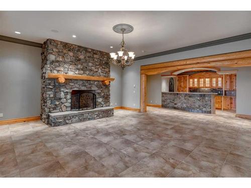 32138 Township Road 260, Rural Rocky View County, AB - Indoor Photo Showing Living Room With Fireplace