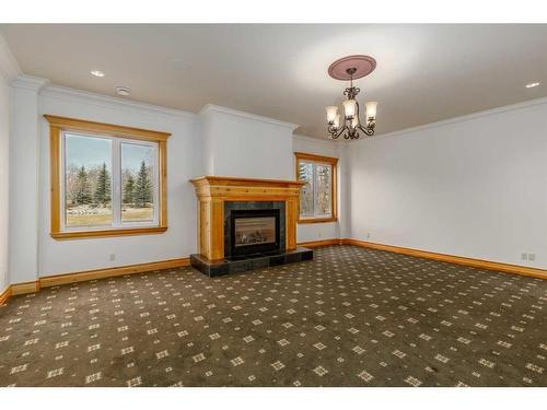 32138 Township Road 260, Rural Rocky View County, AB - Indoor Photo Showing Living Room With Fireplace