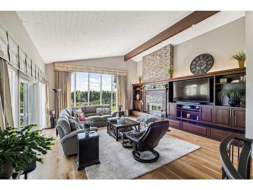 13036 Canso Place Sw, Calgary, AB - Indoor Photo Showing Living Room With Fireplace