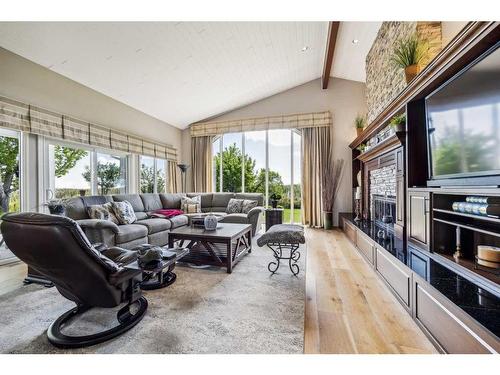 13036 Canso Place Sw, Calgary, AB - Indoor Photo Showing Living Room With Fireplace