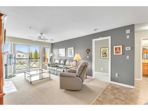 1315-303 Arbour Crest Drive Nw, Calgary, AB - Indoor Photo Showing Living Room