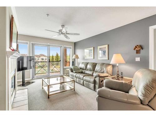 1315-303 Arbour Crest Drive Nw, Calgary, AB - Indoor Photo Showing Living Room