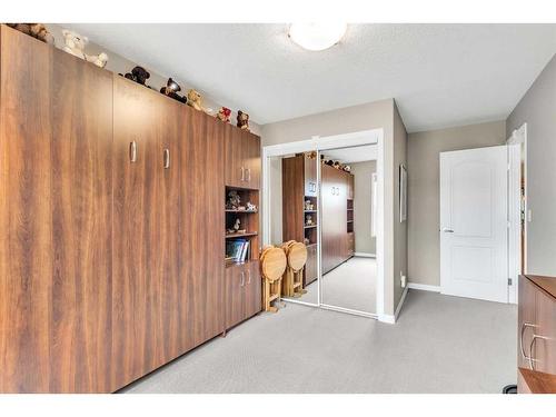 1315-303 Arbour Crest Drive Nw, Calgary, AB - Indoor Photo Showing Other Room