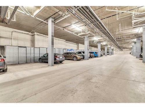 1315-303 Arbour Crest Drive Nw, Calgary, AB - Indoor Photo Showing Garage