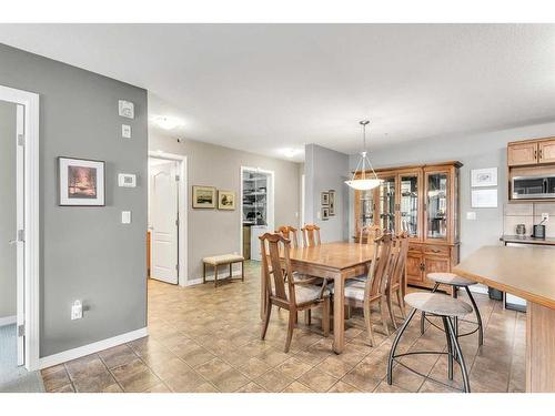 1315-303 Arbour Crest Drive Nw, Calgary, AB - Indoor Photo Showing Dining Room